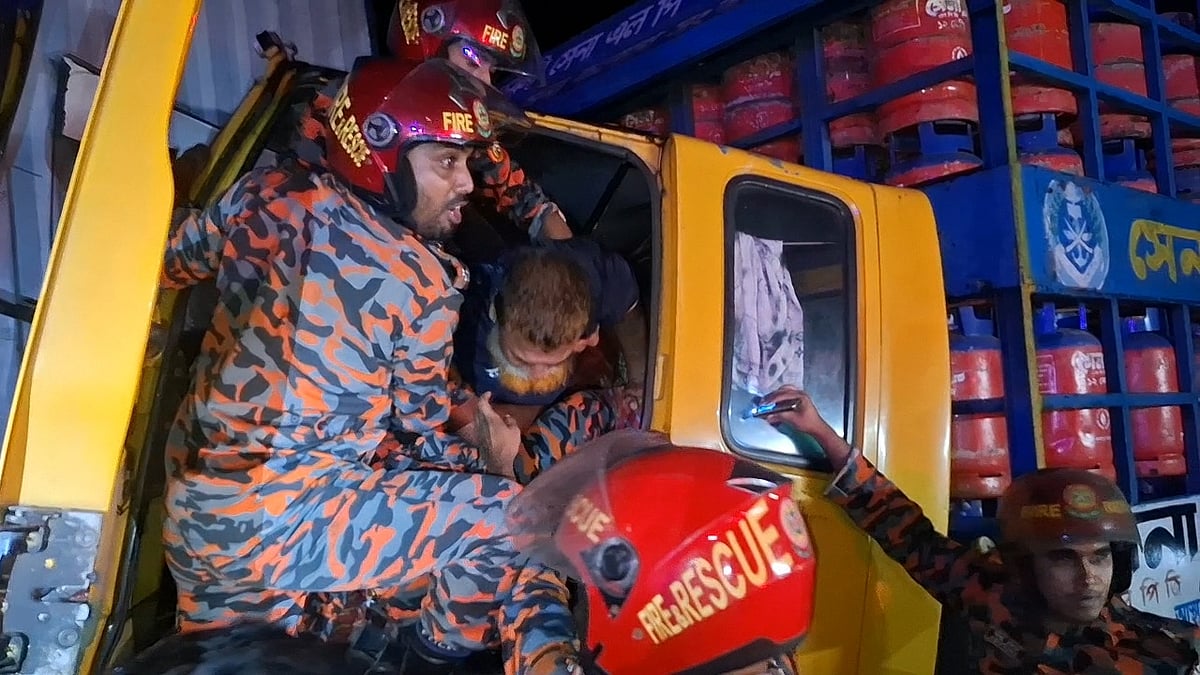 Truck driver rescued alive after expressway crash in Munshiganj