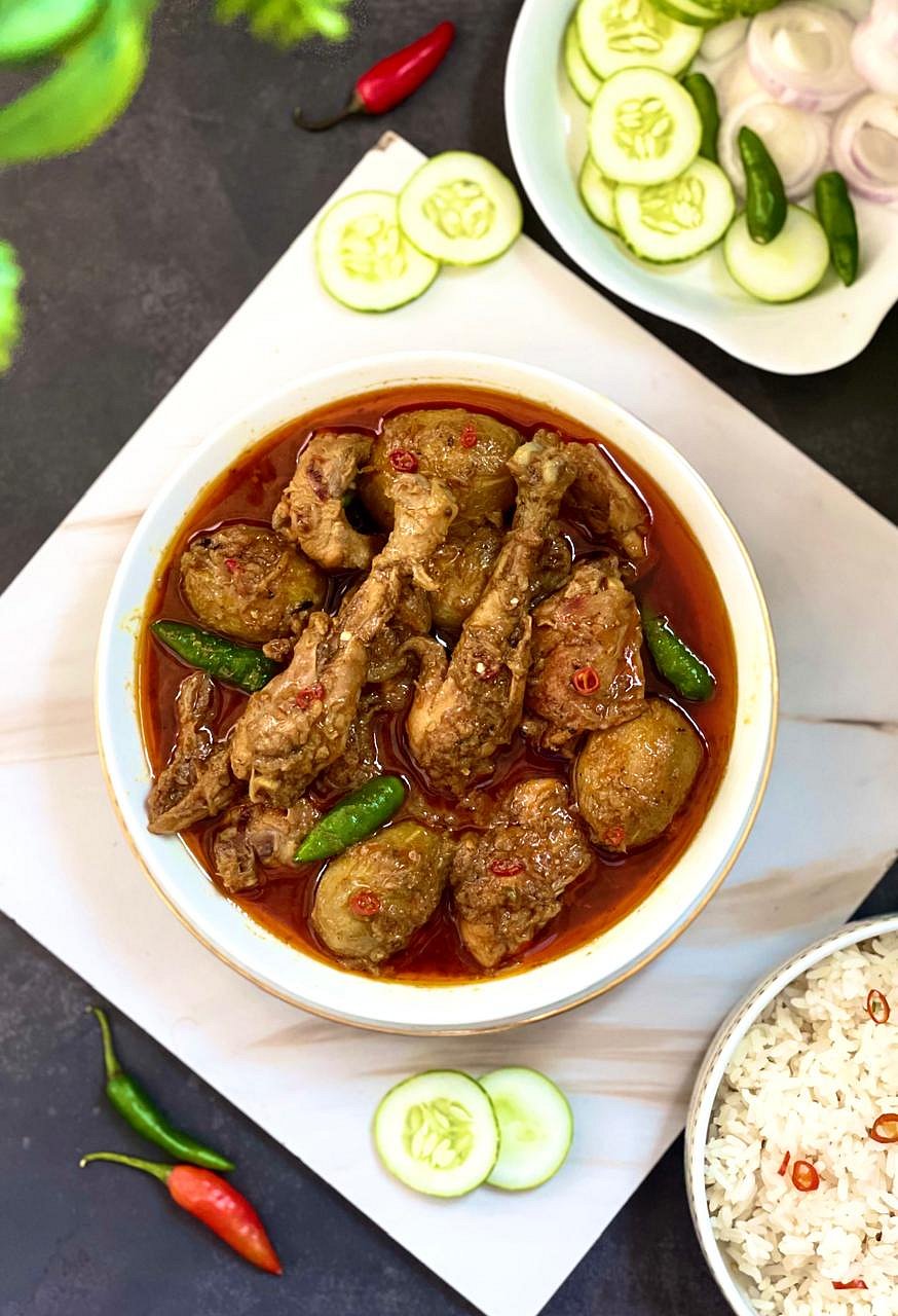 হাল ফ্যাশন শারদীয় ভোজ: মুরগির ঝোলে আমড়ার টক-মিষ্টি টুইস্ট