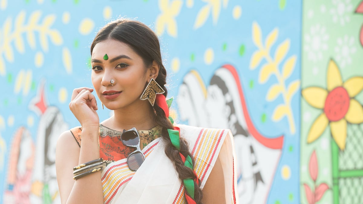 শিউলি ফুলের নাকফুল বাড়িয়েছে শোভা