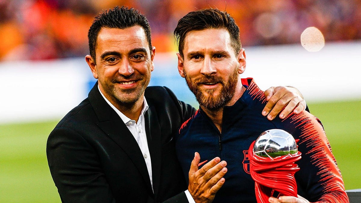 এক ফ্রেমে জাভি ও মেসি