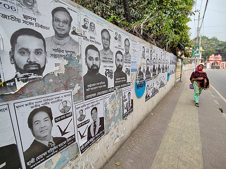 আচরণবিধি লঙ্ঘন করে দেয়ালে সাঁটানো হয়েছে পোস্টার। গতকাল রাজধানীর লালবাগে