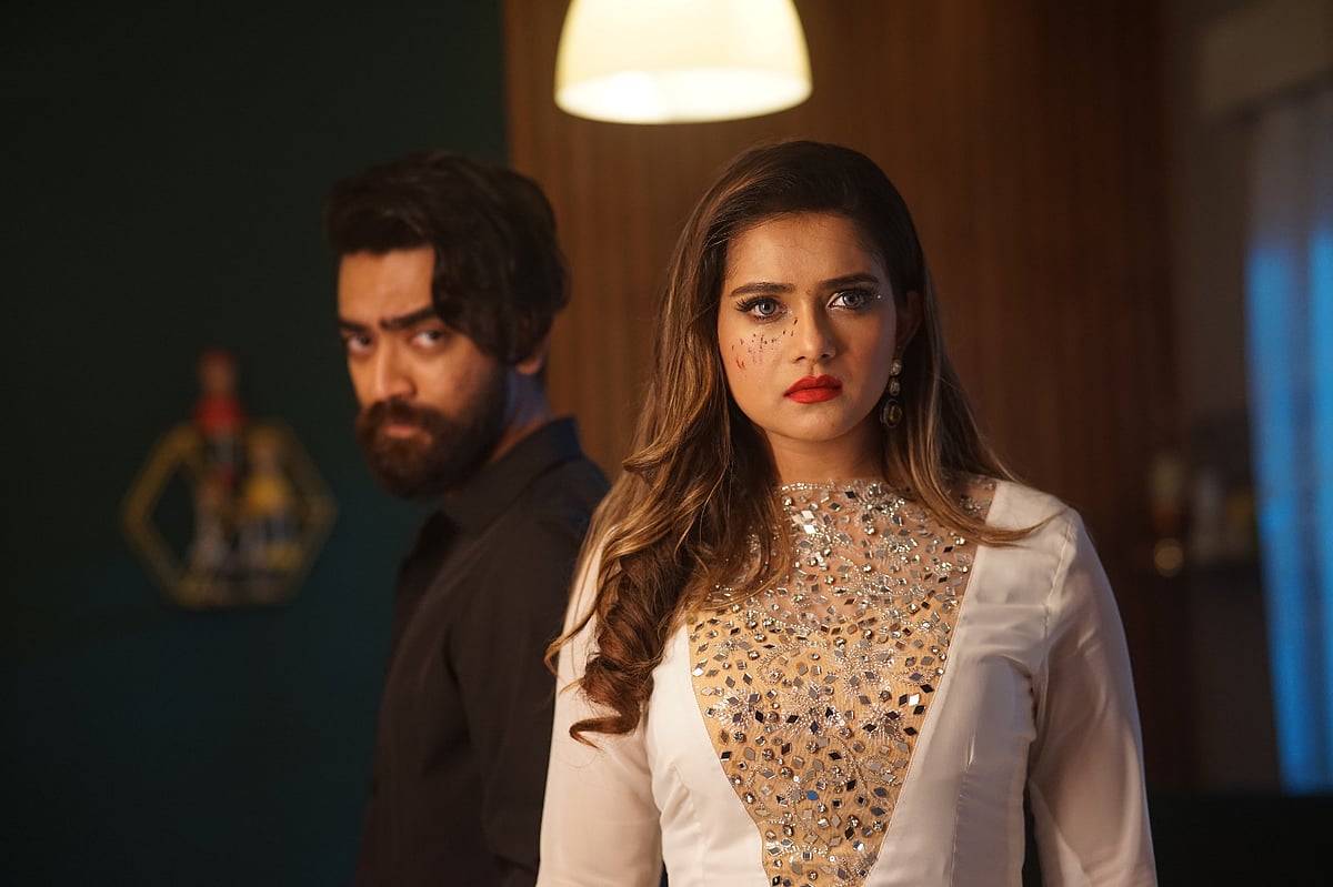 ‘পয়জন’ সিনেমার দৃশ্যে তানজিন তিশা ও আবু হুরায়রা তানভীর