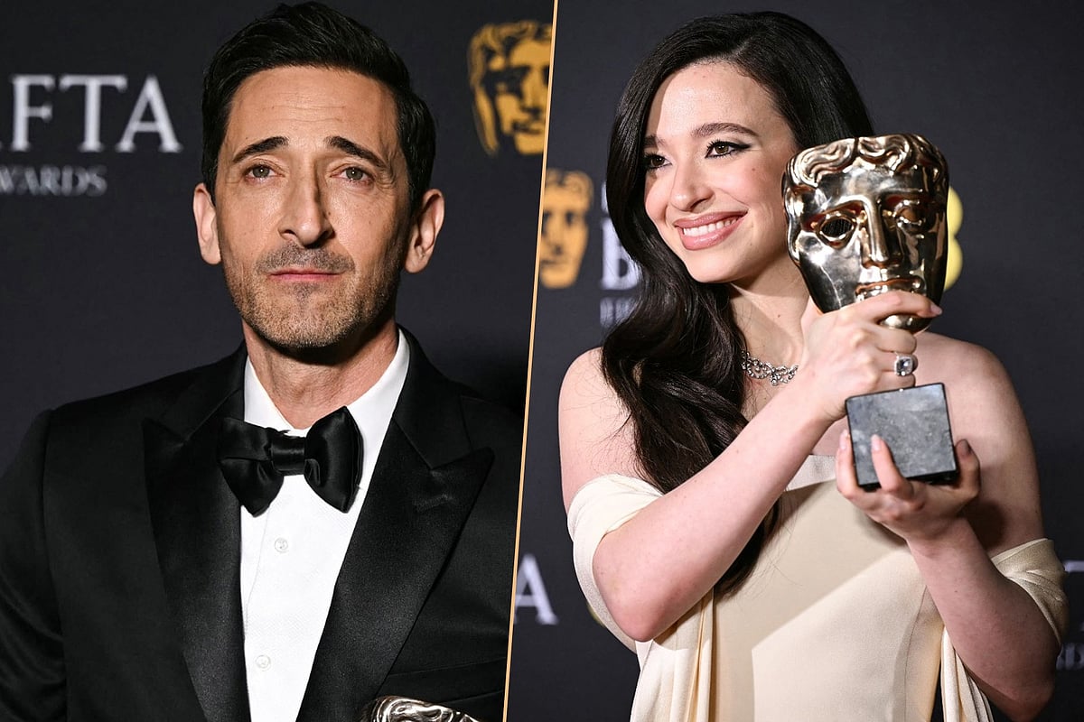 পুরস্কার হাতে অ্যাড্রিয়েন ব্রডি ও মাইকি ম্যাডিসন। এএফপি