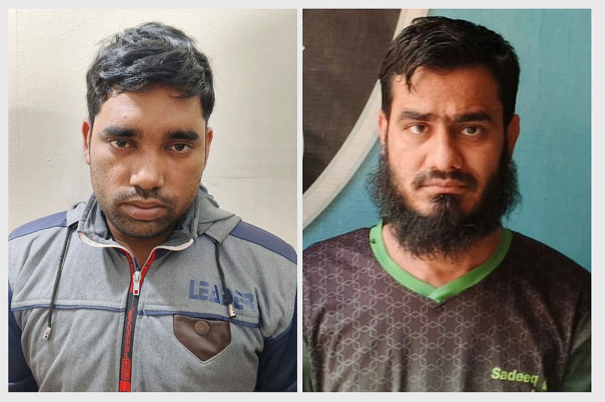 রাসেল হক (বাঁয়ে) ও মিন্টু ফরাজী