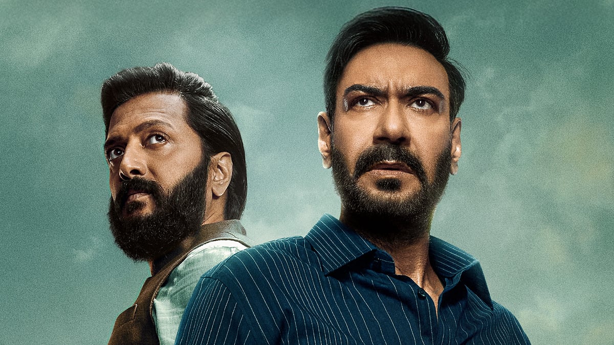 ‘রেইড ২’ সিনেমার পোস্টারে রিতেশ দেশমুখ ও অজয় দেবগন। নেটফ্লিক্স