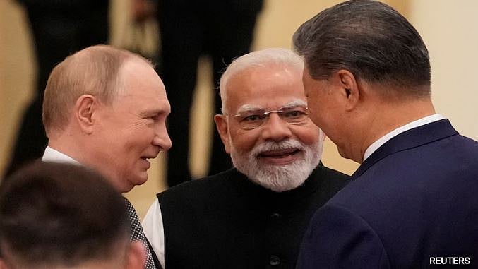 সম্মেলনের ছবিতে একসঙ্গে চীনের সি চিন পিং ও রাশিয়ার ভ্লাদিমির পুতিনের সঙ্গে ভারতের নরেন্দ্র মোদিকে দেখা যাচ্ছে।