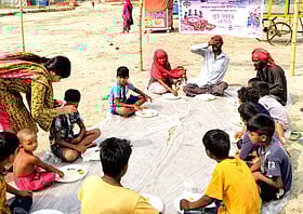 ব্রহ্মপুত্রের বালুচরে শিশুদের নিয়ে পান্তা-ইলিশের উৎসব
