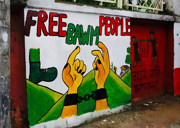 কারাগারে আটক থাকা বমদের মুক্তির দাবিতে গ্রাফিতি
