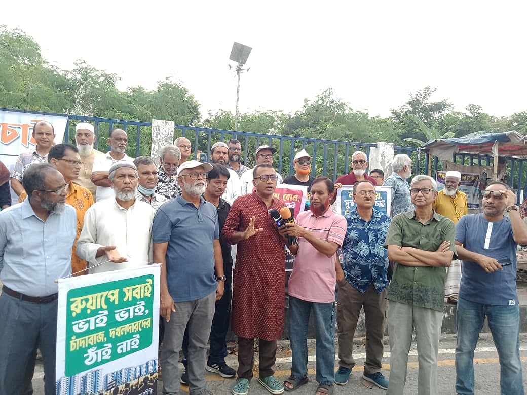 উত্তরায় রাজউকের আবাসন প্রকল্পে অবৈধ দখল, মাদক ব্যবসা, চাঁদাবাজির অভিযোগ, বাসিন্দাদের মানববন্ধন