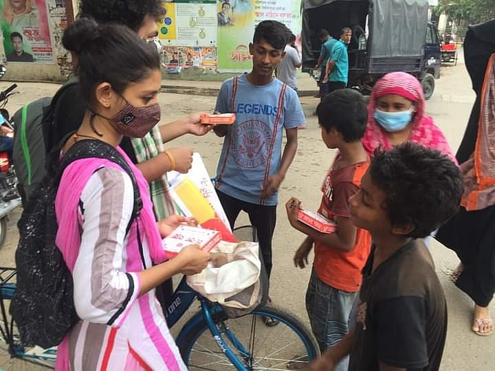 Distributing meals to the needy during the lockdown