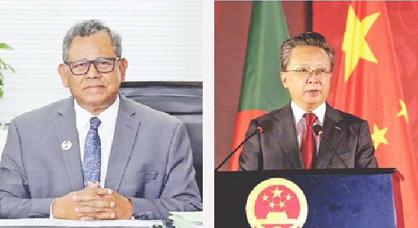 Acting foreign secretary Md. Khurshed Alam (L) and China ambassador to Bangladesh Li Jiming