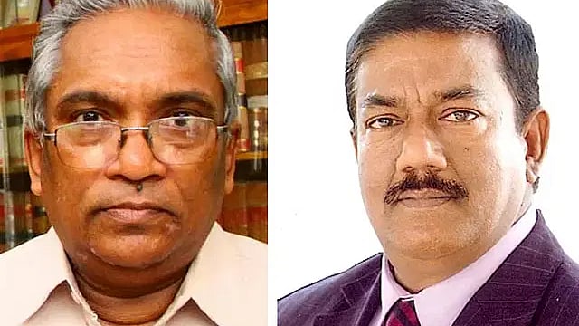 Bangladesh Hindu Buddhist Christian Oikya Parishad general secretary Rana Dashgupta (L) and chief coordinator of AL’s election steering committee Kabir Bin Anwar