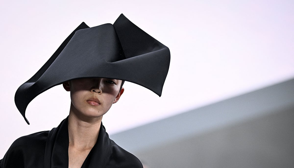 A model presents a hat by Dior for the Women Ready-to-wear Spring-Summer 2026 collection as part of the Paris Fashion Week, in Paris on 1 October, 2025.