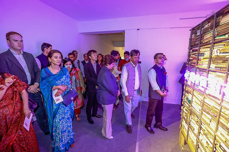 Diplomats from various countries and including Transcom Group CEO Simeen Rahman attended the art exhibition at the Prothom Alo building, which had been burned in a fire set by extremists.