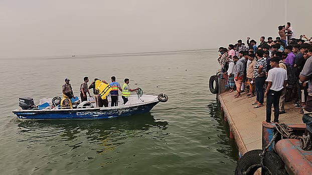 2 bodies recovered after bus falls into Padma, rain hampers rescue