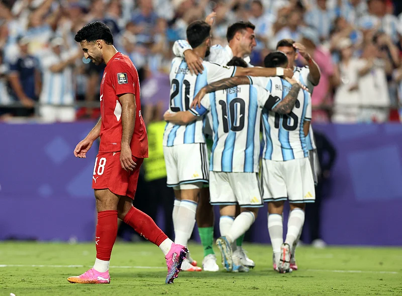 Football - FIFA World Cup 2026 - Quarter Final - Argentina v Switzerland - Kansas City Stadium, Kansas City, Missouri, U.S. - July 11, 2026
Switzerland's Eray Comert looks dejected after Argentina's Lautaro Martinez scores their third goal 