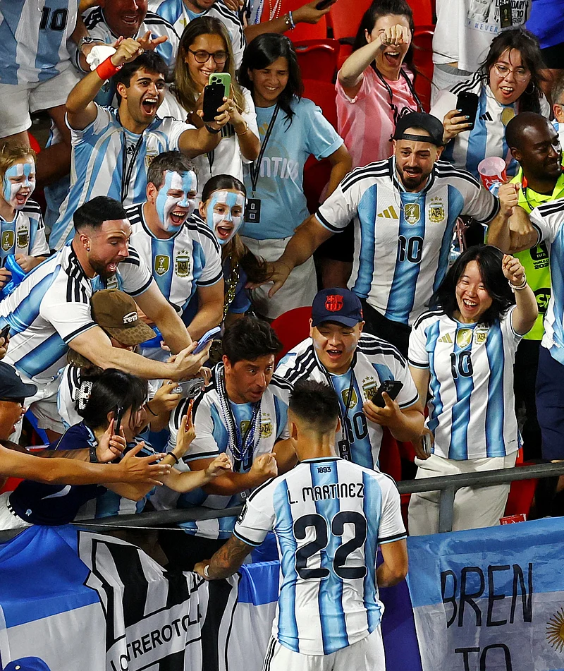 Football - FIFA World Cup 2026 - Quarter Final - Argentina v Switzerland - Kansas City Stadium, Kansas City, Missouri, U.S. - July 11, 2026
Argentina's Lautaro Martinez celebrates scoring their third goal with fans 