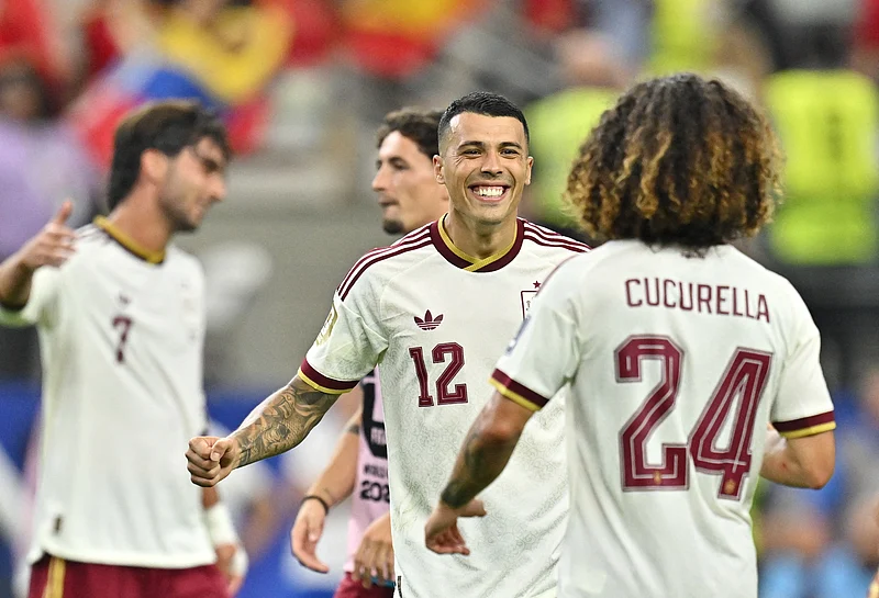 Football - FIFA World Cup 2026 - Semi Final - France v Spain - Dallas Stadium, Arlington, Texas, U.S. - July 14, 2026
Spain's Pedro Porro and Marc Cucurella celebrate after the match 