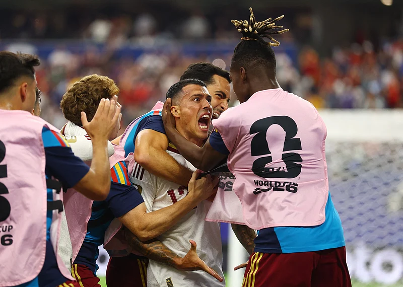  Football - FIFA World Cup 2026 - Semi Final - France v Spain - Dallas Stadium, Arlington, Texas, U.S. - July 14, 2026
Spain's Pedro Porro celebrates scoring their second goal with teammates 