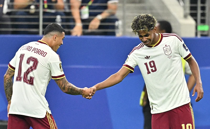 Football - FIFA World Cup 2026 - Semi Final - France v Spain - Dallas Stadium, Arlington, Texas, U.S. - July 14, 2026
Spain's Pedro Porro celebrates scoring their second goal with teammate Lamine Yamal 