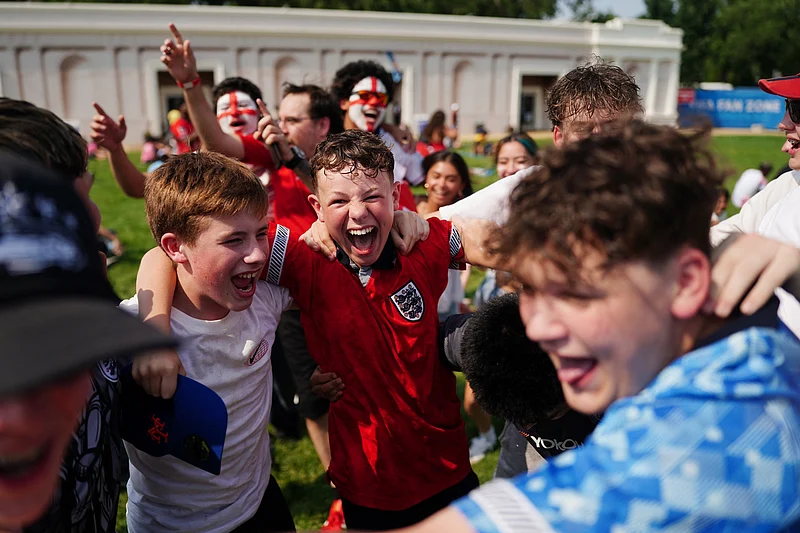 Football - FIFA World Cup 2026 - Semi Final - England v Argentina - Fans gather in Washington, D.C. - Washington, D.C., U.S. - July 15, 2026
England fans celebrate at the fan zone after Anthony Gordon scores their first goal 
