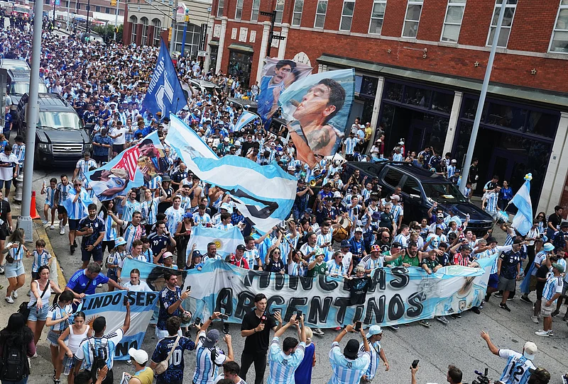 Soccer Football - FIFA World Cup 2026 - Semi Final - England v Argentina - Fans gather in Atlanta - Atlanta, Georgia, U.S. - July 15, 2026
Argentina fans display Lionel Messi and Diego Maradona flags before the match REUTERS/Megan Varner