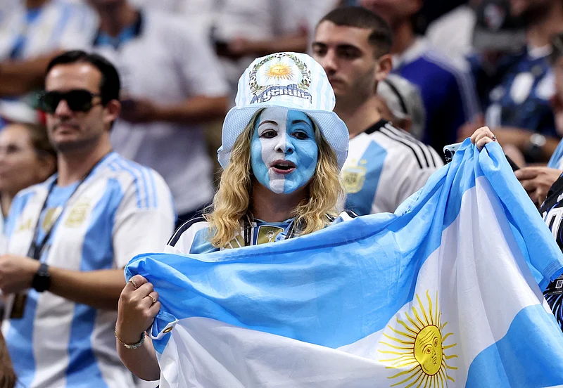 Soccer Football - FIFA World Cup 2026 - Semi Final - England v Argentina - Atlanta Stadium, Atlanta, Georgia, U.S. - July 15, 2026
An Argentina fan with face paint and the national flag inside the stadium before the match IMAGN IMAGES via Reuters/Brett Davis