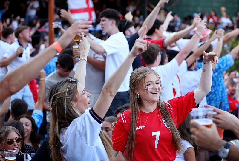 Soccer Football - FIFA World Cup 2026 - Semi Final - England v Argentina - Fans gather in Manchester - 4TheFans Fan Park, Freight Island, Manchester, Britain - - July 15, 2026
England fans react before the match REUTERS/Ed Sykes