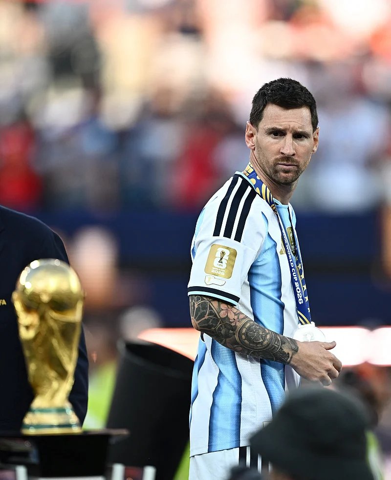 Soccer Football - FIFA World Cup 2026 - Final - Spain v Argentina - New York/New Jersey Stadium, East Rutherford, New Jersey, U.S. - July 19, 2026
Argentina's Lionel Messi looks dejected as he walks past the World Cup trophy before the presentation REUTERS/Dylan Martinez