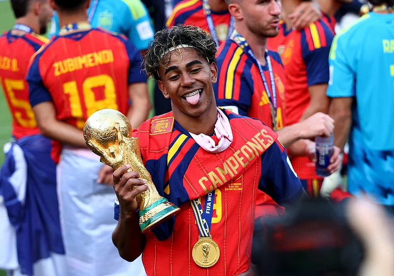 Soccer Football - FIFA World Cup 2026 - Final - Spain v Argentina - New York/New Jersey Stadium, East Rutherford, New Jersey, U.S. - July 19, 2026
Spain's Lamine Yamal celebrates with the World Cup trophy after winning the World Cup IMAGN IMAGES via Reuters/Mark J Rebilas