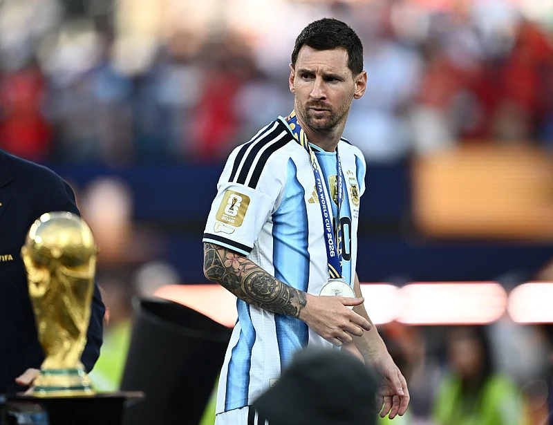 Soccer Football - FIFA World Cup 2026 - Final - Spain v Argentina - New York/New Jersey Stadium, East Rutherford, New Jersey, U.S. - July 19, 2026
Argentina's Lionel Messi looks dejected as he walks past the World Cup trophy after losing the World Cup final REUTERS/Dylan Martinez