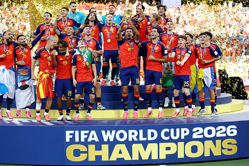 Soccer Football - FIFA World Cup 2026 - Final - Spain v Argentina - New York/New Jersey Stadium, East Rutherford, New Jersey, U.S. - July 19, 2026
Spain's Rodri lifts the trophy with teammates after winning the World Cup REUTERS/Kai Pfaffenbach