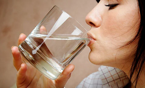 Drink water for hydration. File photo