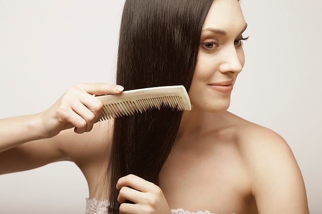 Brushing hair regularly makes your hair strong and healthy. File photo