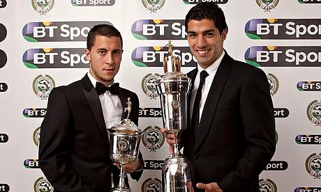 Liverpool's Luis Suarez, right, with the player of the year award and Eden Hazard with the young player award in London. Photo: the guardian