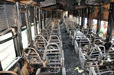 Three compartments of a Dhaka-bound inter-city train were burnt in a fire at the Cantonment Rail Station in Dhaka on Tuesday afternoon. Photo: Prothom Alo
