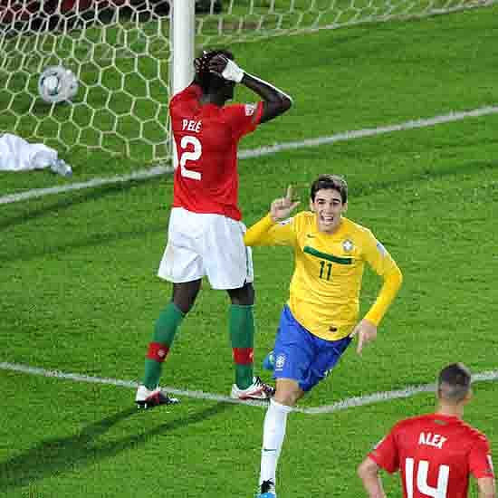 Brazilian midfielder Oscar celebrates after scoring against Portugal during the FIFA 2011 Under-20 World Cup final match in Bogota on August 20, 2011. Brazil won 3-2 in overtime. Photo: AFP