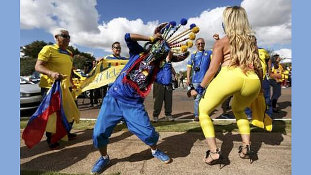 Brazilian singer known as Mc Bandida dances during the arrival of the Ecuador national team to their hotel in Brasilia, June 13, 2014. Reuters