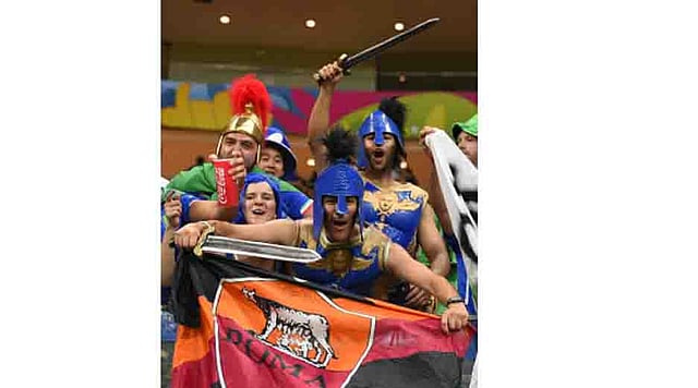 Italy fans celebrate after Italy won their Group D football match against England at the Amazonia Arena in Manaus during the 2014 FIFA World Cup on June 14, 2014. AFP