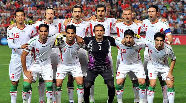 Iranian players pose before their World Cup Asian qualifier football match against South Korea in Ulsan, some 300 km southeast of Seoul, on June 18, 2013. Iran won the match 1-0. AFP