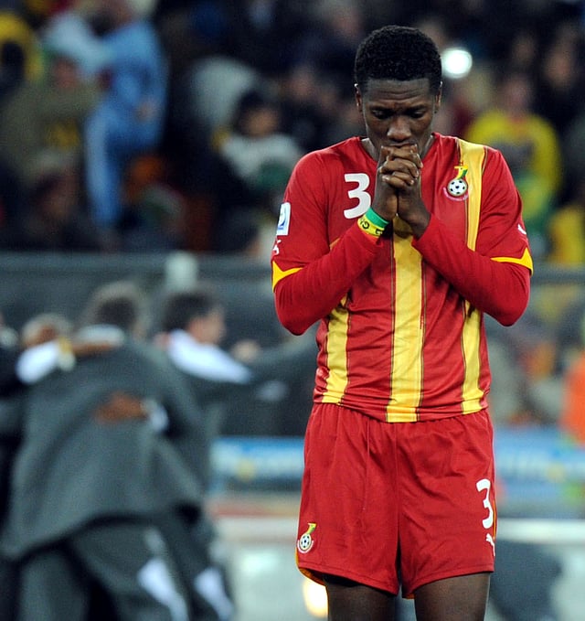 Ghana's striker Asamoah Gyan reacts at the end of the penalties shootout during the of 2010 World Cup quarter-final match Uruguay vs. Ghana on July 2, 2010 at AFP Soccer City stadium in Soweto, suburban Johannesburg. Uruguay won the match to quqlify for the semi-finals. AFP