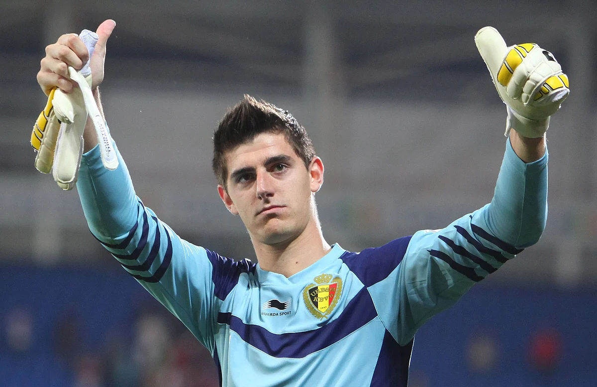 Belgian Goalkeeper Thibaut Courtois salutes fans at the end of the 2014 World Cup Qualifying football match between Wales and Belgium at Cardiff City Stadium, Cardiff, Wales, on September 7, 2012. Belgium won 2-0. AFP