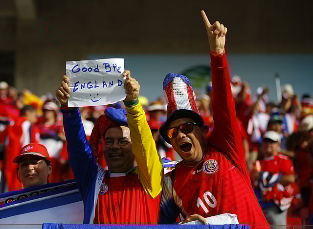 Fans of Costa Rica celebrate at the end of their 2014 World Cup Group D soccer match against Italy at the Pernambuco arena in Recife on June 20, 2014. Reuters