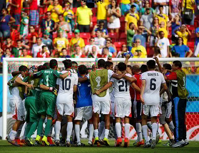 Costa Rica players celebrate after winning the 2014 World Cup Group D match against Italy at the Pernambuco arena in Recife on June 20, 2014. Reuters