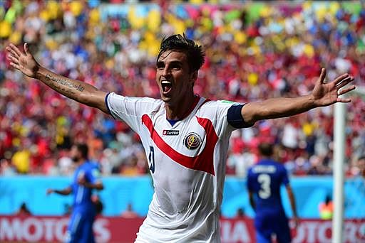 Costa Rica's forward Bryan Ruiz celebrates after scoring his team's first and winning goal against Italy at the Pernambuco Arena in Recife on 20 June 2014. AFP