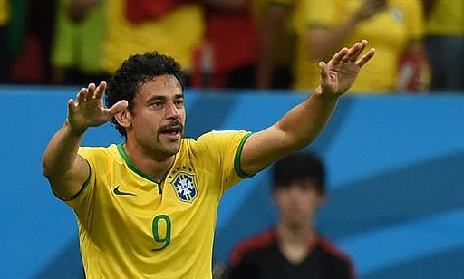 Brazil's forward Fred celebrates after scoring during a Group A football match between Cameroon and Brazil at the Mane Garrincha National Stadium in Brasilia during the 2014 FIFA World Cup on June 23, 2014. AFP