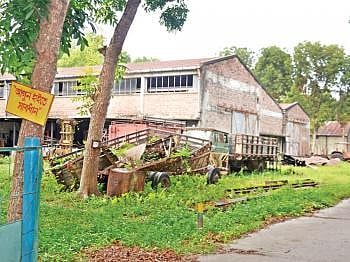 Machinery and transports are left abandoned on the premises of North Bengal Paper Mill at Pakshi in Pabna. Photo: Prothom Alo