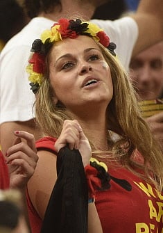 A Belgian fan celebrates their victory at the end of a Group H football match between South Korea and Belgium at the Corinthians Arena in Sao Paulo during the 2014 FIFA World Cup on June 26, 2014. Belgium won 1-0. AFP
