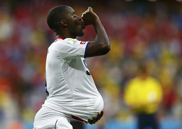 Costa Rica's Joel Campbell celebrates with the match ball after scoring against Uruguay during their 2014 World Cup Group D soccer match at the Castelao stadium in Fortaleza June 14, 2014. Photo: Reuters