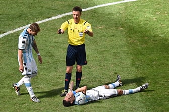 Argentina's midfielder Angel Di Maria lies on the ground during a quarter-final football match between Argentina and Belgium at the Mane Garrincha National Stadium in Brasilia during the 2014 FIFA World Cup on July 5, 2014. AFP